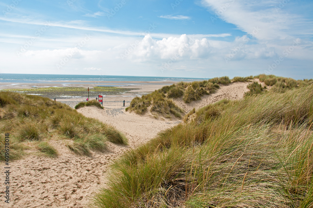 Sand dunes and beach scenery in the summertime. Sand dunes and beach scenery in the summertime.