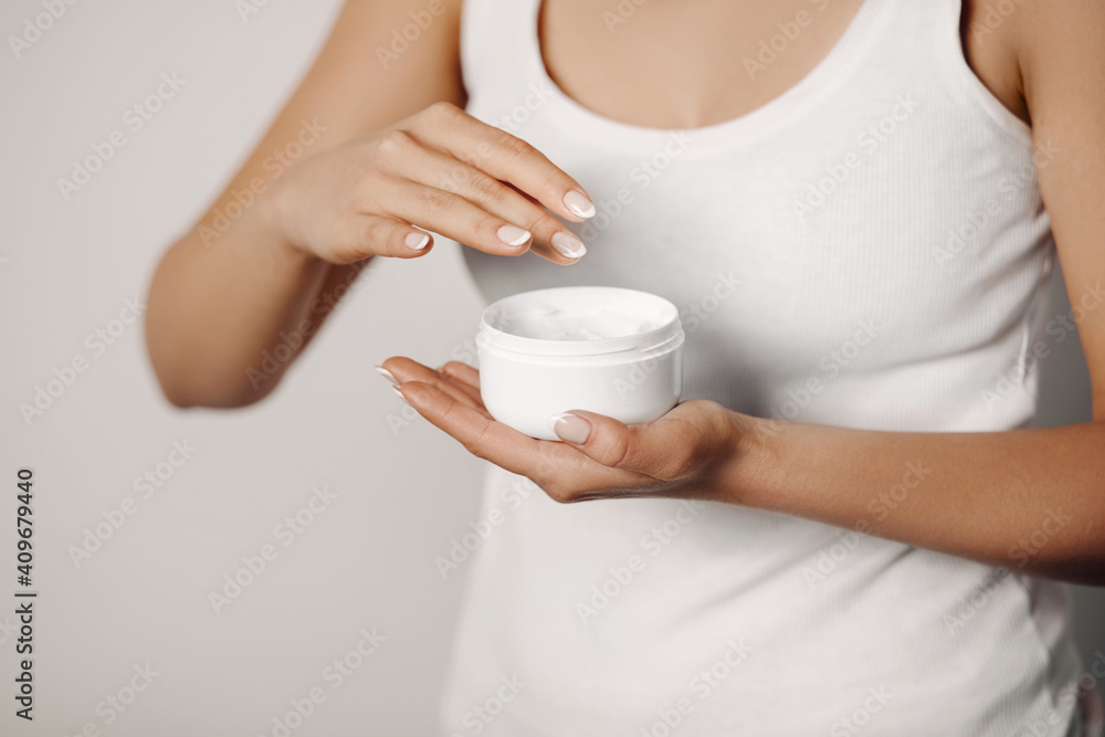 .Skin Care Concept. Beautiful Woman With Hand Cream, Lotion On Her Hands. Close Up Photo of Female Hands Applying Cosmetic Cream On Soft Skin. Beauty Concept .Skin Care Concept. Beautiful Woman With Hand Cream, Lotion On Her Hands. Close Up Photo of Female Hands Applying Cosmetic Cream On Soft Skin. Beauty Concept
