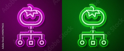 Glowing neon line Genetically modified food icon isolated on purple and green background. GMO fruit. Vector.