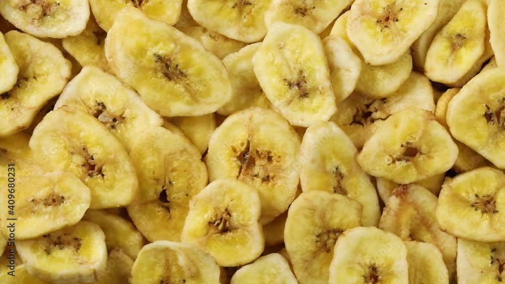 Dried sweet banana chips close up full frame Dried sweet banana chips close up full frame