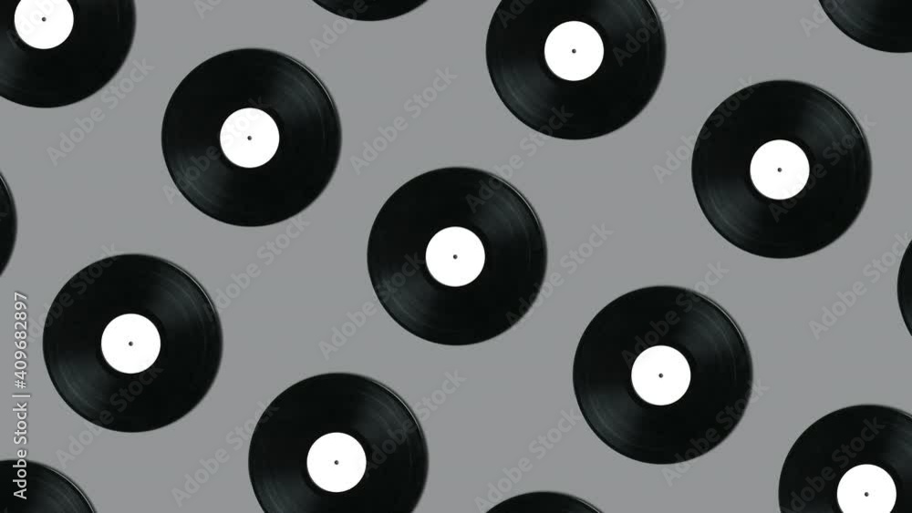 Geometric pattern with retro vinyl disks on a gray background. Minimal motion graphics music animation concept Geometric pattern with retro vinyl disks on a gray background. Minimal motion graphics music animation concept