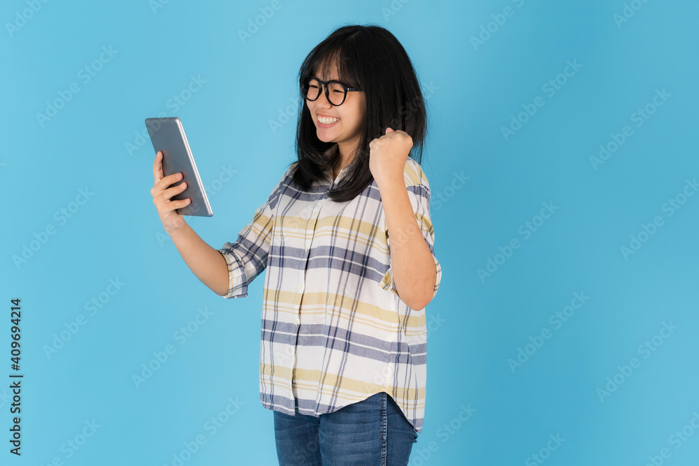 Happy asian girl Standing with using tablet Happy asian girl Standing with using tablet