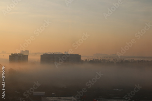fog in the morning at dawn in the city