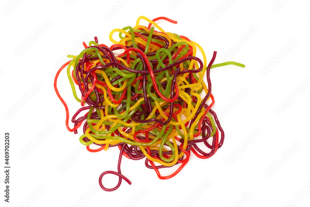 Tasty jelly spaghetti isolated on white background. Candy stripes. Tasty jelly spaghetti isolated on white background. Candy stripes.