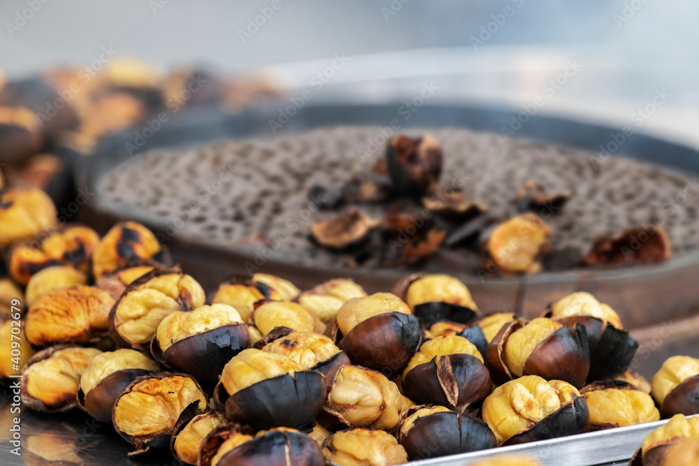 Roasted chestnuts. Street food. Shallow depth of field.