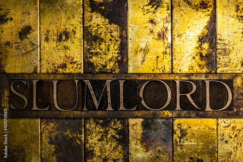 Slumlord text on vintage textured grunge copper and gold background