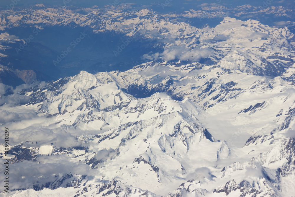 Alps - aerial view from window of airplane Alps - aerial view from window of airplane
