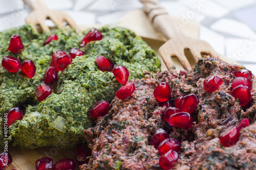 Traditional food Pkhali dish with vegetables and pomegranate photo