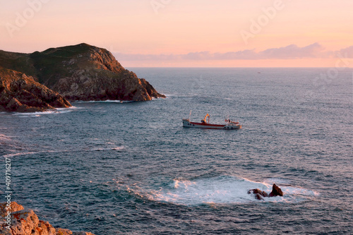 Boat extracting the remains of the Cason shipwreck. Cason shipwreck was on December the 5th of 1987. The iron and metal remains was extracted during the 2017 summer. photo