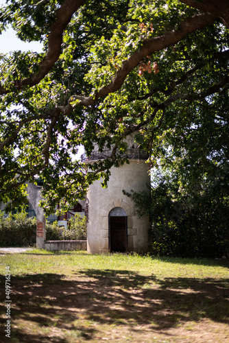 Ruins of an old stone watchtower showing the opened gate.