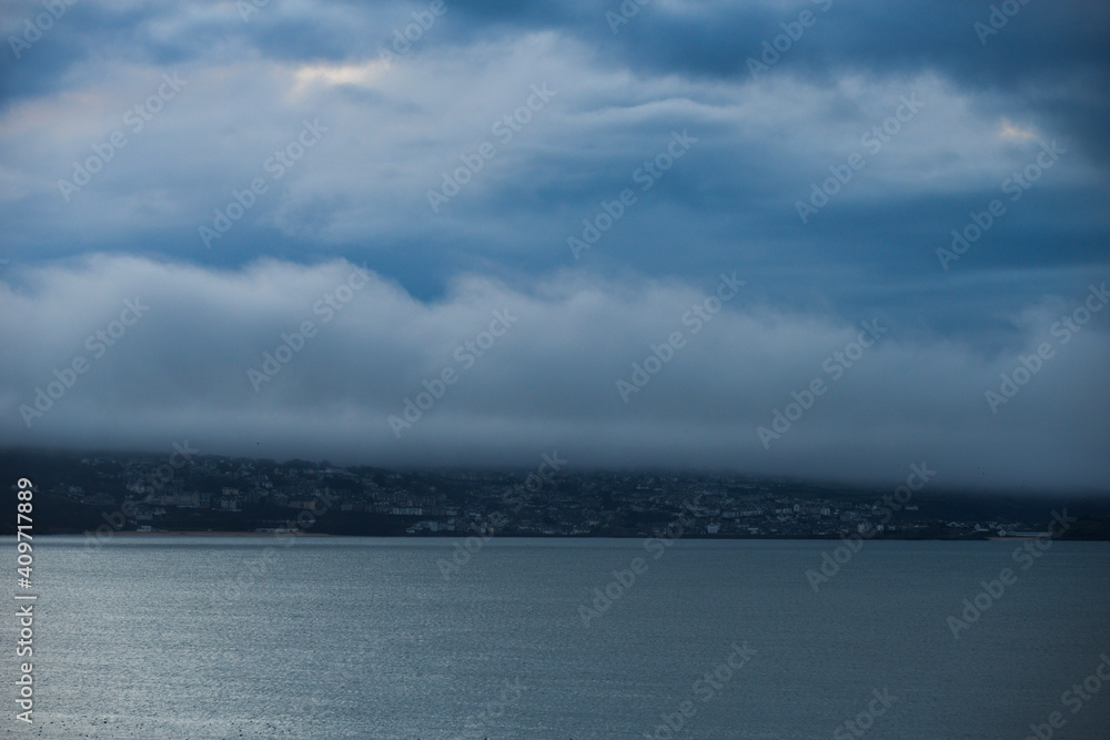 Clear over sea low cloud over St Ives Cornwall