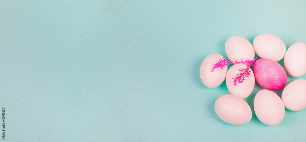 Easter. White eggs with red, on a uniform blue background.