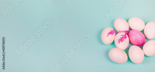 Easter. White eggs with red, on a uniform blue background.