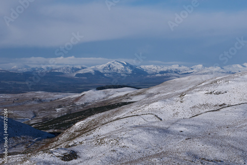 snow covered mountainous scenery on a freezing summer day in Scotland