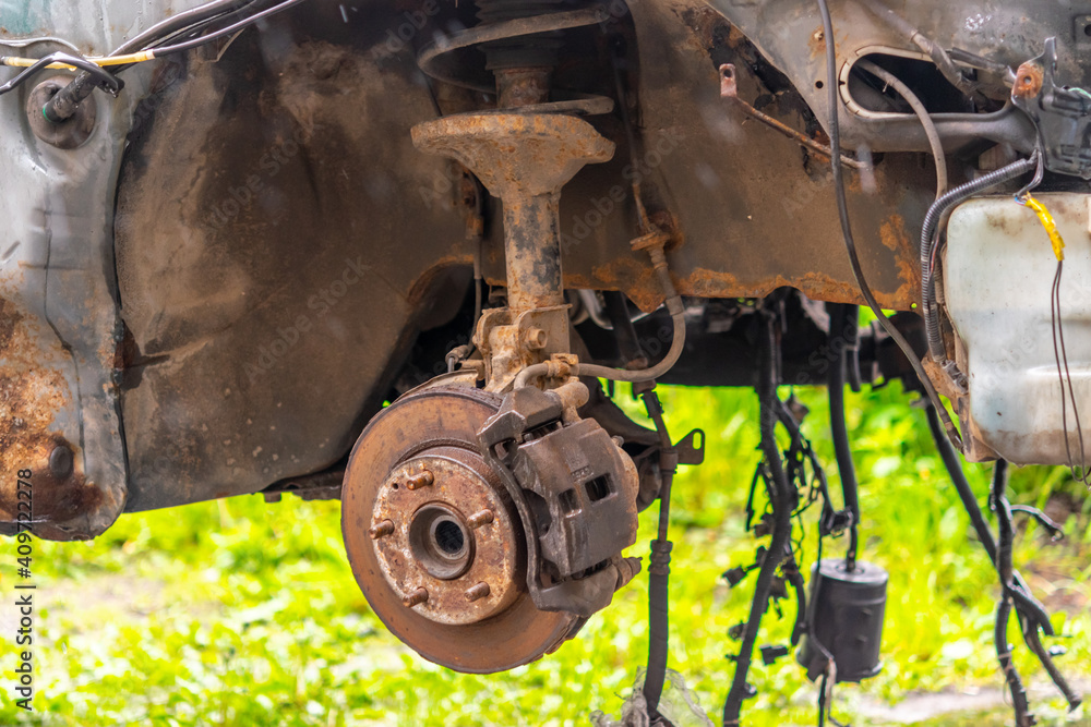 The rusty old interior of the car is not restored. The car body after