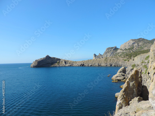 Mountain sea bay panorama. Sea bay in mountains. Mountain sea bay view.