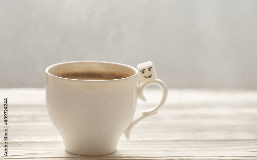 White sugar cube on cup of coffee. Smile. Concept. White sugar cube on cup of coffee. Smile. Concept.