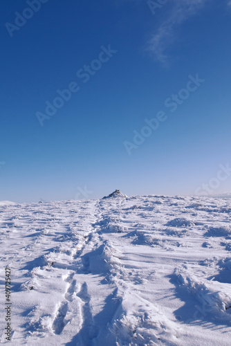 Wallpaper Mural snow path leading to top of a hill in Scottish Hills under blue sky Torontodigital.ca