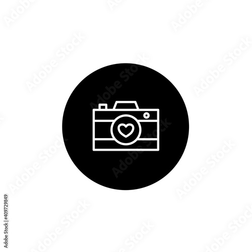 Love camera icon in black round style. Love and affection icon