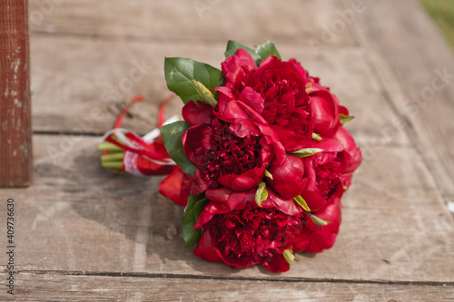 Huge red peonies on the plank floor 2866.