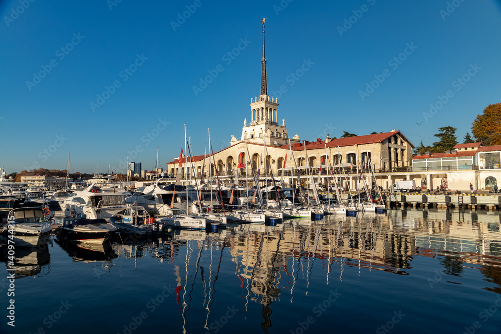 The building of the sea station in Sochi on a sunny day with a view of the yachts.