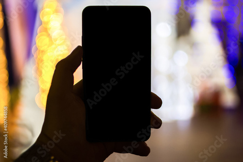 Smartphone in hand. Mock up