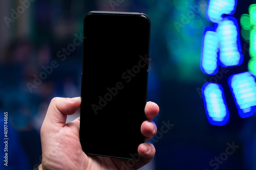 Smartphone in hand. Mock up