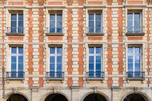 Paris, place des Vosges, beautiful buildings with a public park 
