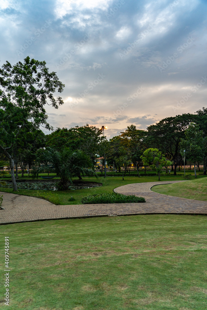 Vertical photo of beautiful public park at dusk 