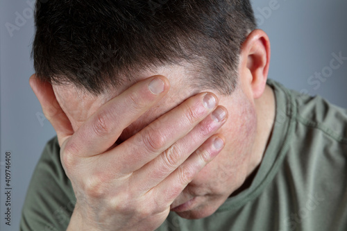 фотографія Closeup of a depressed mature man