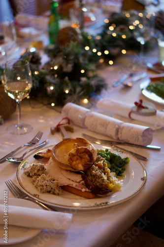 Christmas Day roast with turkey, brussel sprouts, roast potatoes, gravy, stuffing, and yorkshire pudding. Wine with Christmas Day Roast, England. City of Bath roast dinner. 