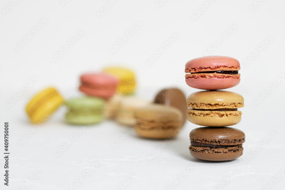 Colorful macaroons on white background