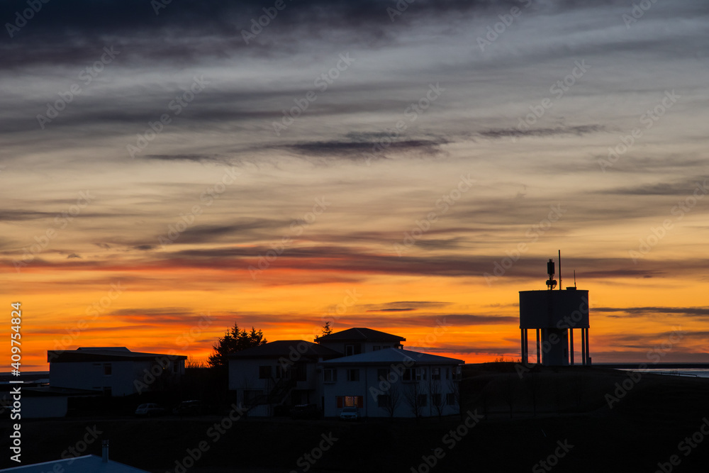 Sunset silhuette of town of Hofn in Iceland