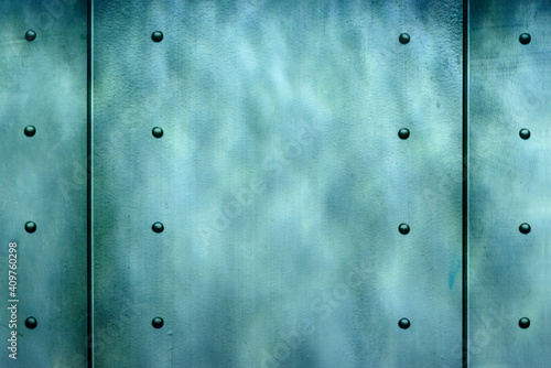 blue background with rivets,light and shadow from the water 