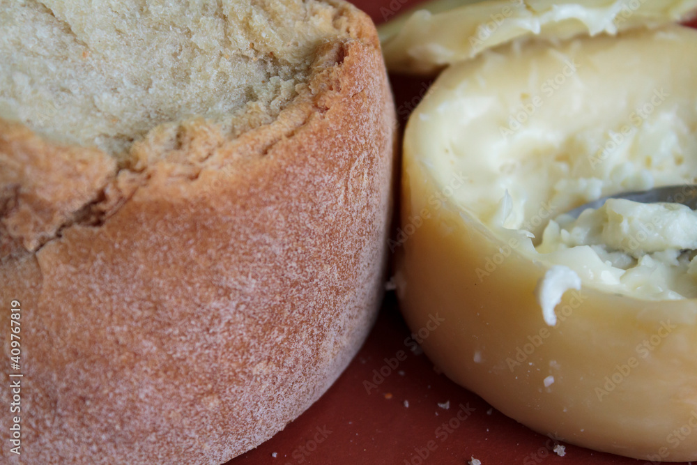 Close-up of creamy and soft cheese and bread Close-up of creamy and soft cheese and bread