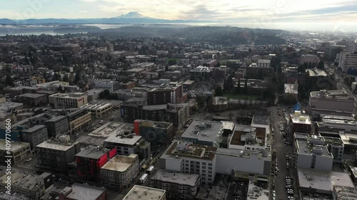 Cinematic aerial - drone dolly shot of Capitol Hill, Pike - Pine, First Hill, Cherry Hill, Squire Park Minor, Atlantic, downtown Seattle with Mt Rainier in the morning in King County, Washington photo