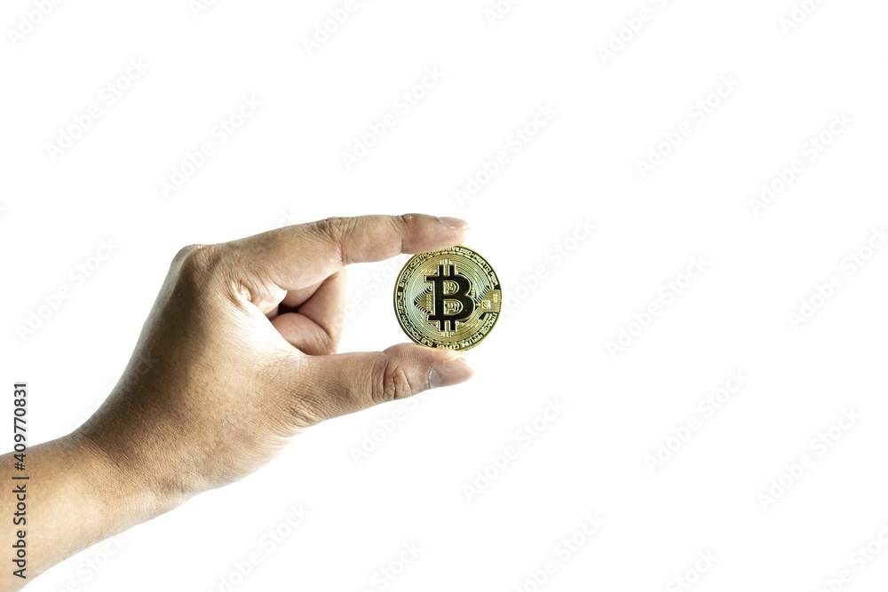 Image of a man holding a gold Bitcoin coin in a white background.