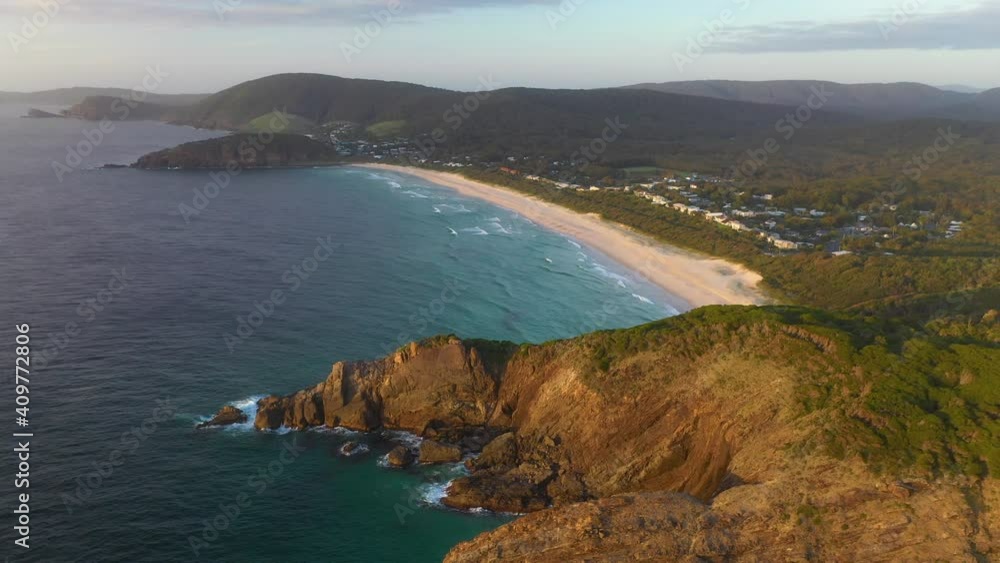Aerial shot of sunset over Boomerang Beach, New South Wales coastline, Australia Aerial shot of sunset over Boomerang Beach, New South Wales coastline, Australia