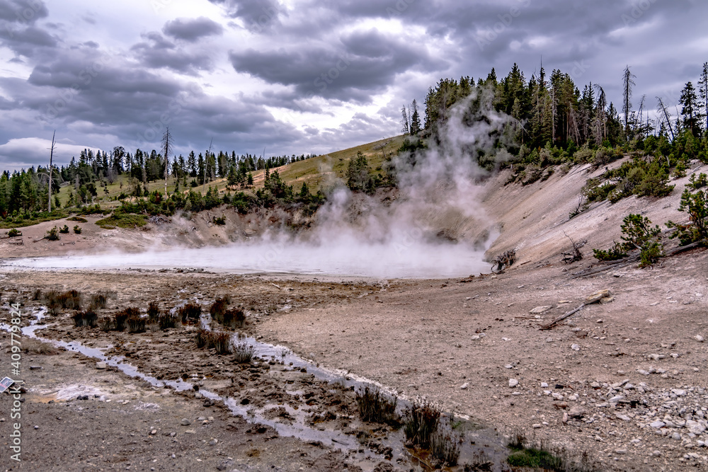 hot spring and geiser in yellowstone national par hot spring and geiser in yellowstone national par