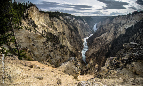 Lower falls of the yellowstone national park from artist point at sunset, wyoming in the usa