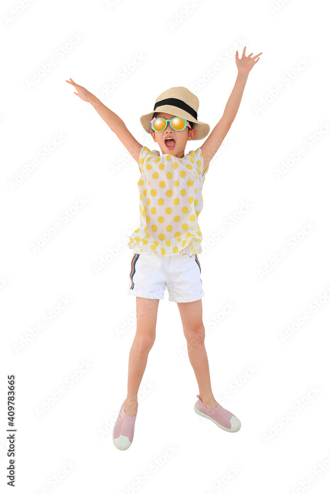 Happy asian little child girl wearing sunglasses and straw hat jumping over white background isolated with clipping path. Summer and fashion concept Happy asian little child girl wearing sunglasses and straw hat jumping over white background isolated with clipping path. Summer and fashion concept