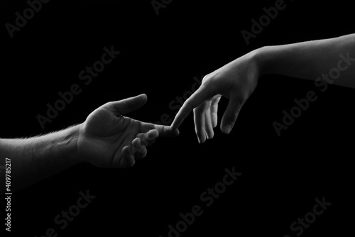 Sensual hand couple. Giving a helping hand. Solidarity, compassion, and charity rescue.