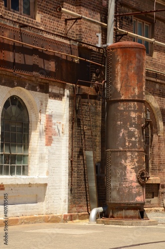 Rusty old industrial furnace outside of Carriageworks in Redfern, Sydney, Australia