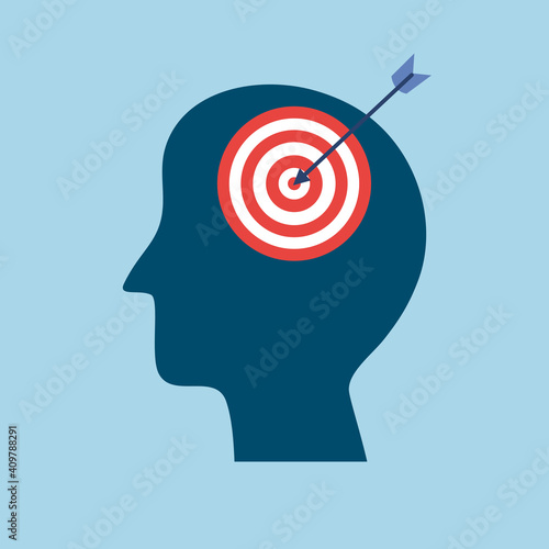 Brain focus and mind focus or concentration concept vector illustration. Silhouette of human head with target sign in flat design. Life goal and planning.