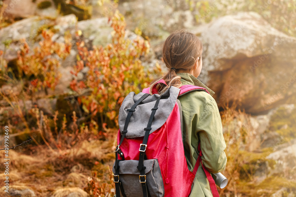 Young female tourist in mountains Young female tourist in mountains