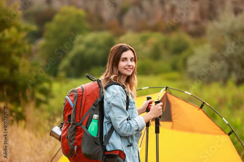 Young female tourist near t...