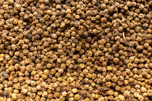 Dried peppercorns. Texture background. Dry pepper spice.