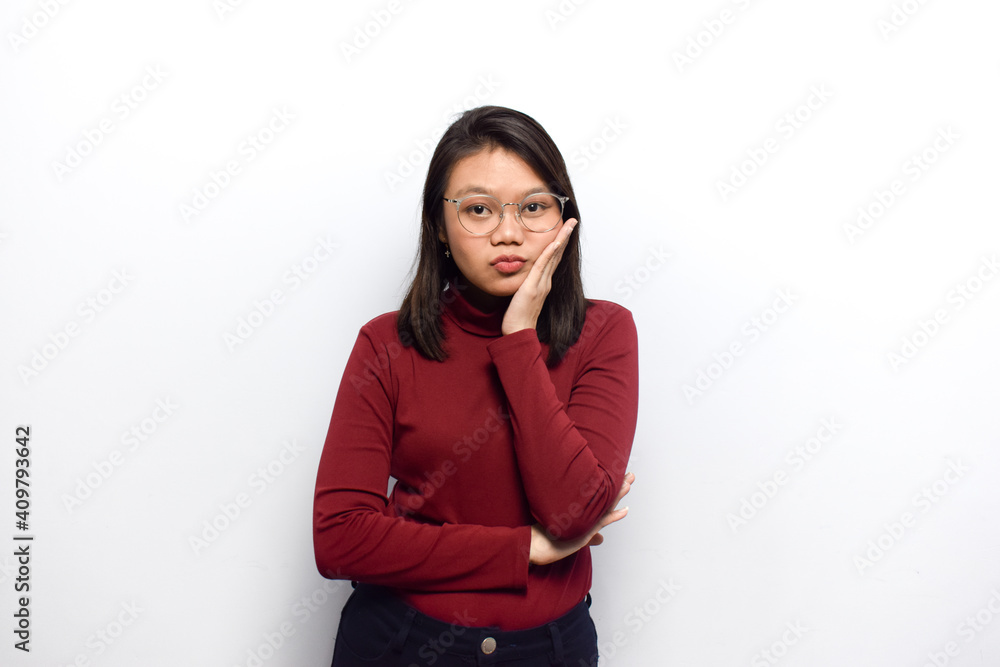 Boring gesture of Young beautiful asian women dress red shirt isolated on white background Boring gesture of Young beautiful asian women dress red shirt isolated on white background