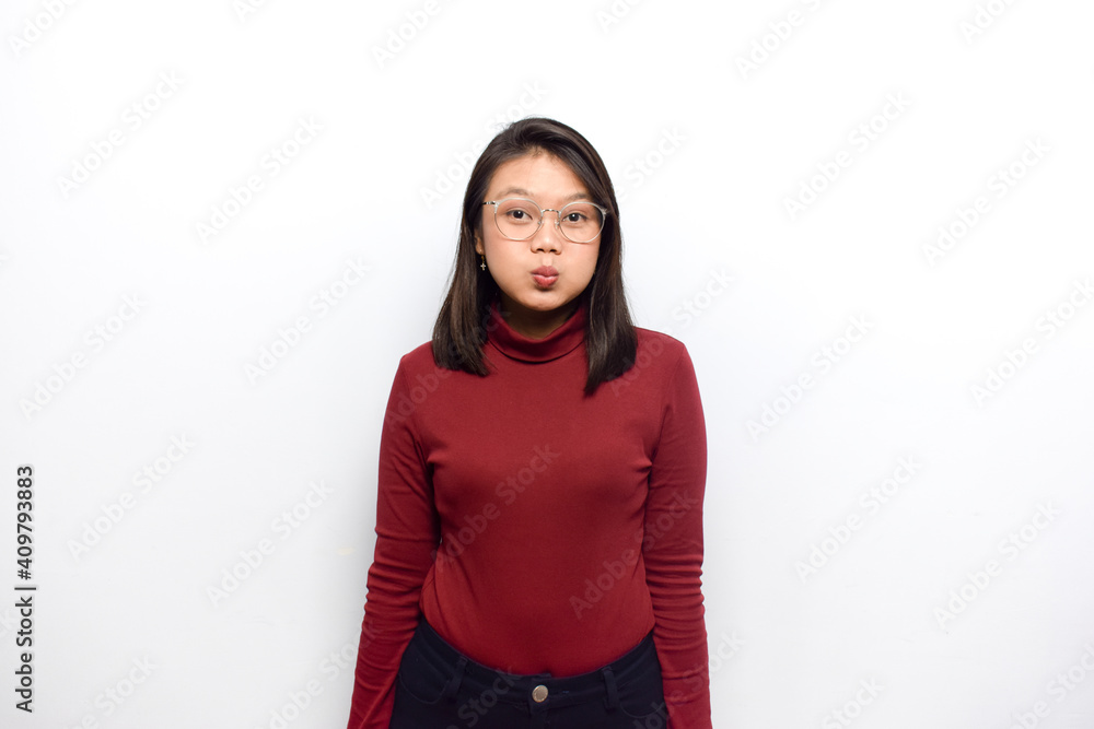 Mouth inflated with air of Young beautiful asian women dress red shirt isolated on white background Mouth inflated with air of Young beautiful asian women dress red shirt isolated on white background