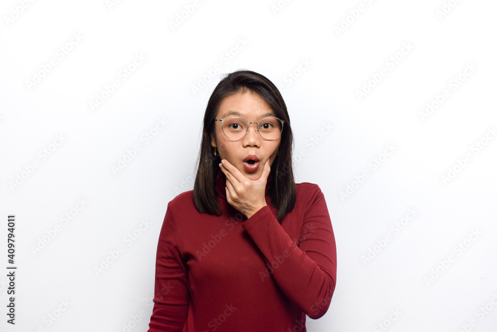 Hand on chin with surprise expression of Young beautiful asian women dress red shirt isolated on white background Hand on chin with surprise expression of Young beautiful asian women dress red shirt isolated on white background